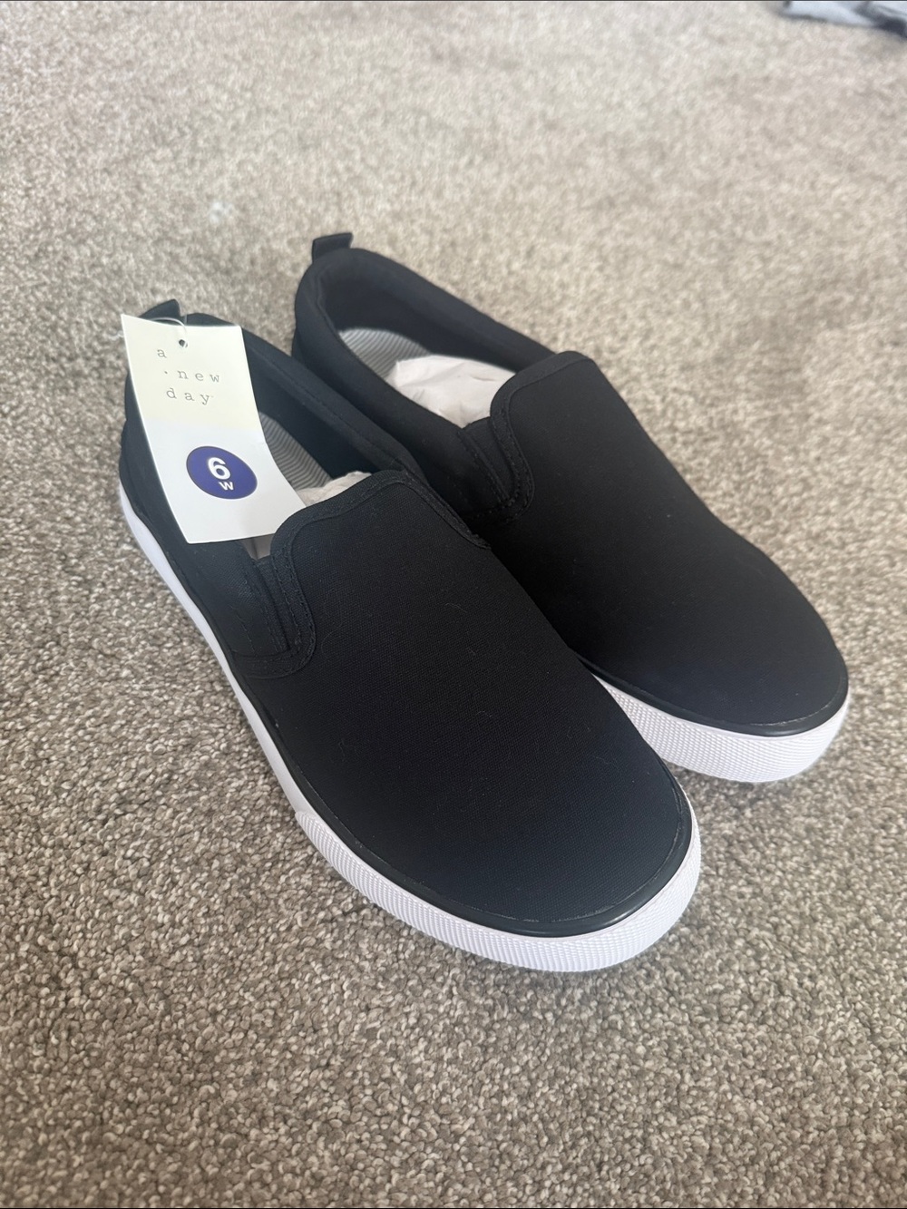 Size six wide Black Slip-On Canvas Loafers women’s